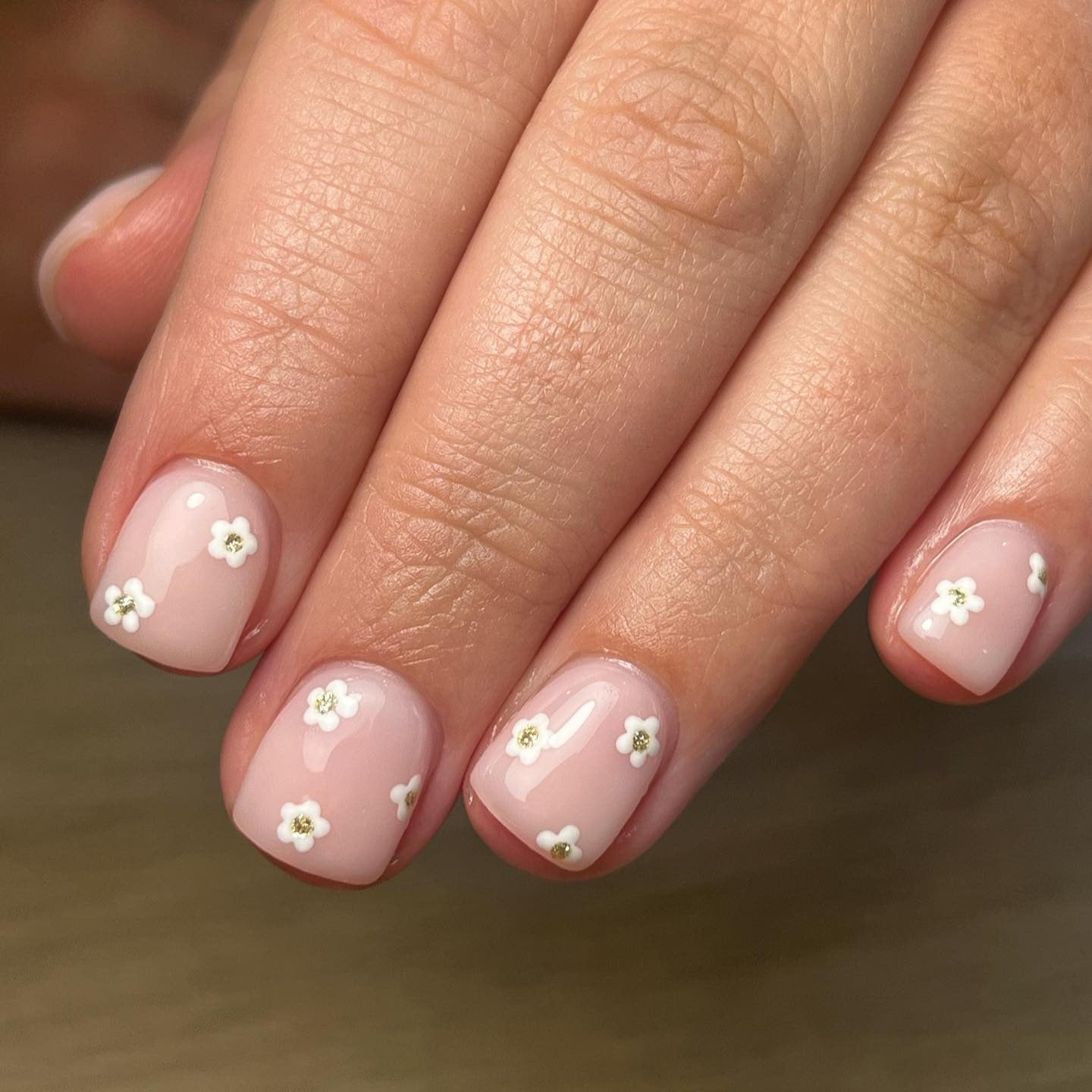 4. Sheer Blush with Tiny Daisies (Cute Nail Ideas for Short Nails)