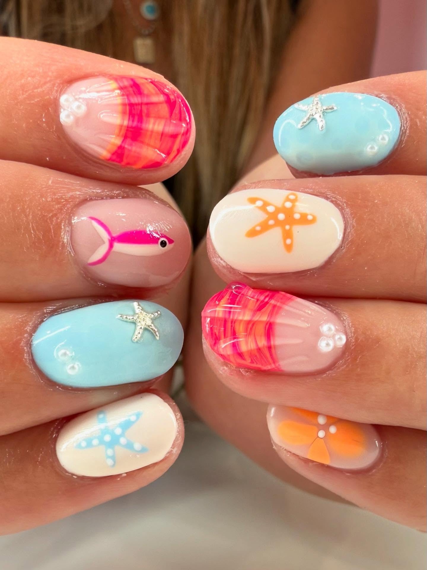 11. Beach Day Nails with Starfish and Sunset Tints (Cute Nail Ideas for Short Nails)
