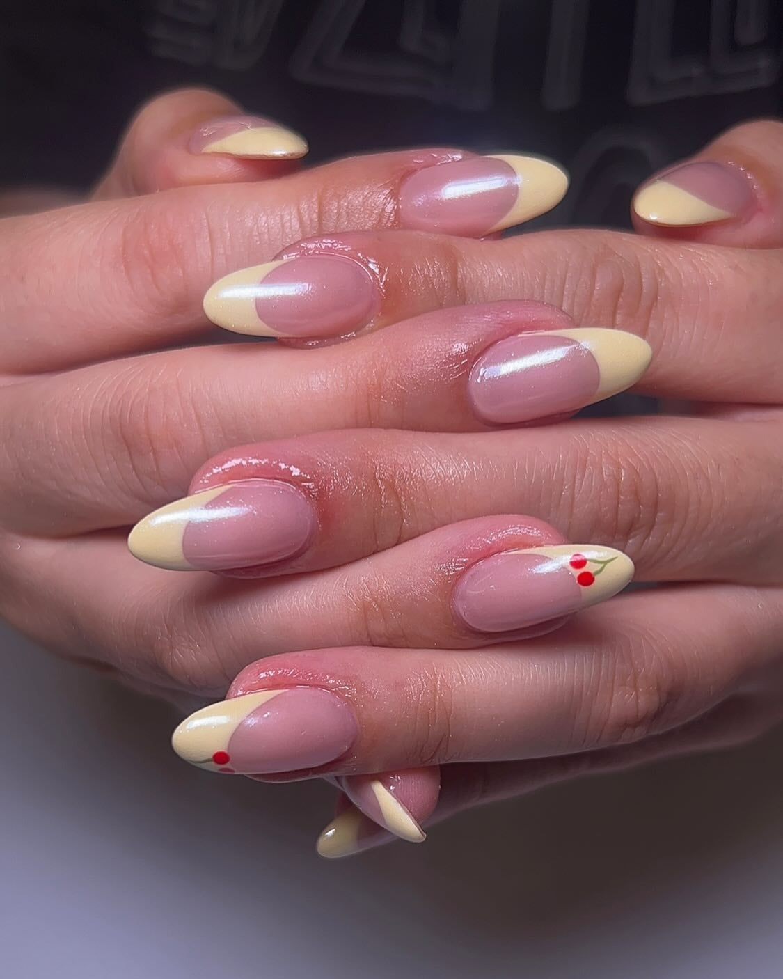 4. Side-Swept Yellow Curve Tips (Yellow French Tip Nail Ideas)