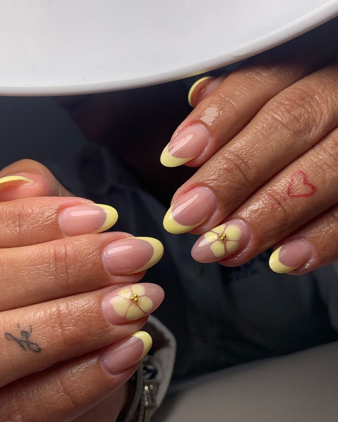 14. Yellow Flower Accent French (Yellow French Tip Nail Ideas)