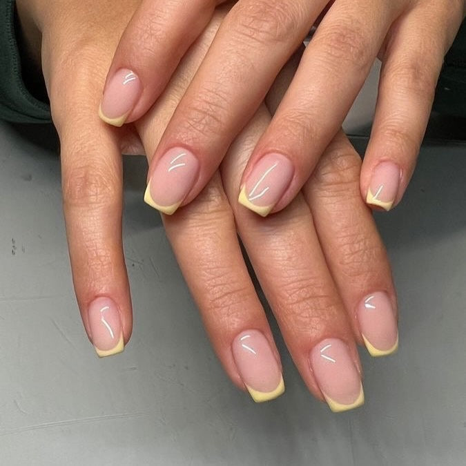 15. Square Pastel Yellow French (Yellow French Tip Nail Ideas)