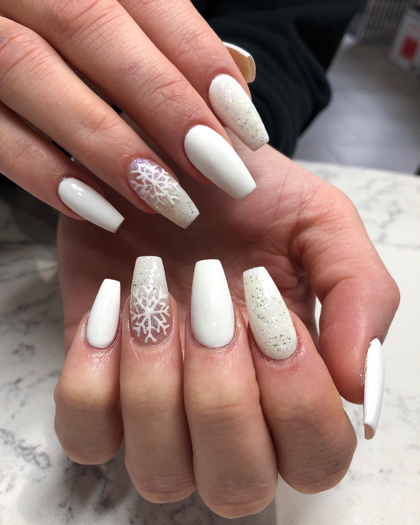 1. Snowflake Sparkle Coffin Nails (White Winter Nail Ideas)