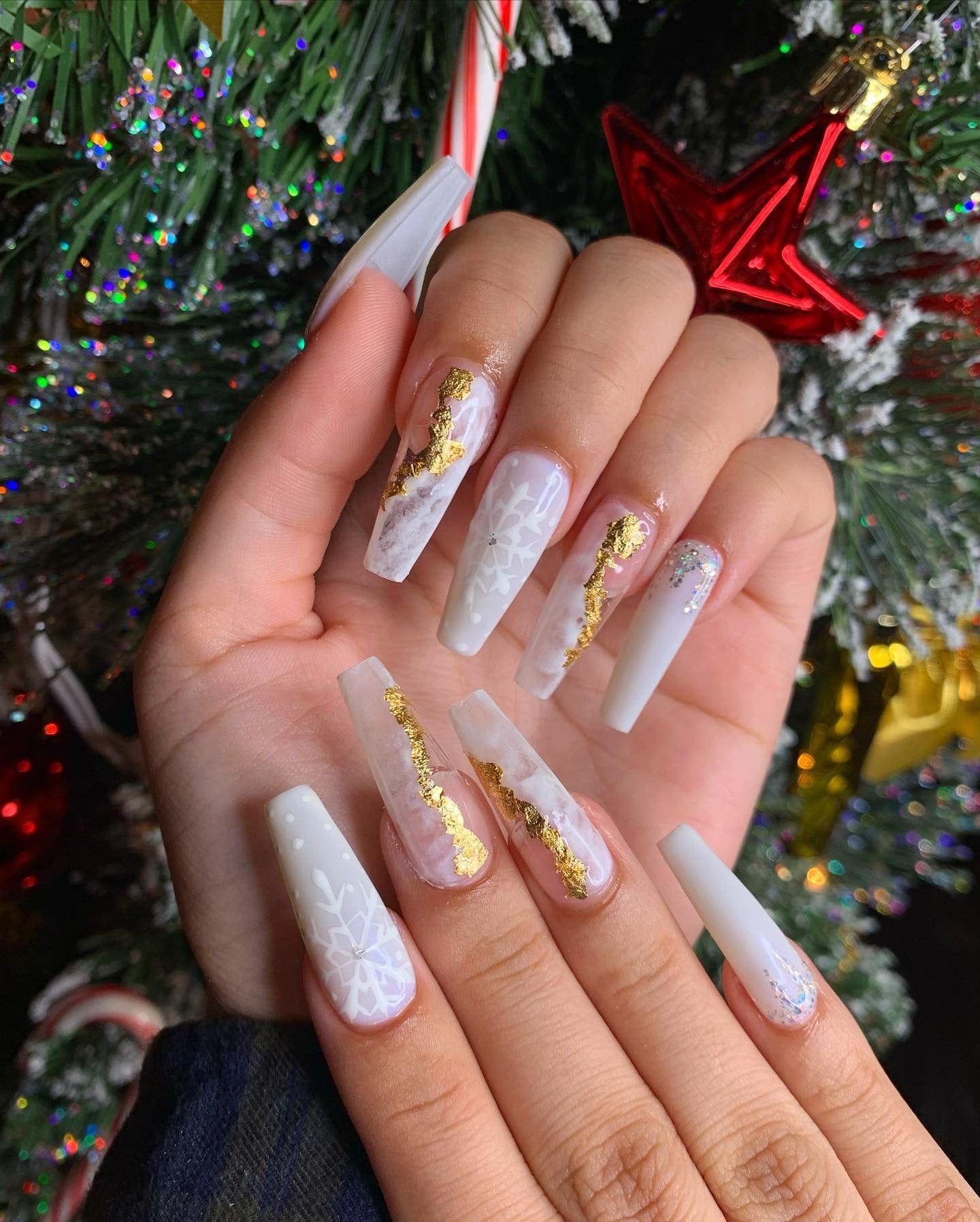 4. White Marble and Gold Winter Glam (White Winter Nail Ideas)