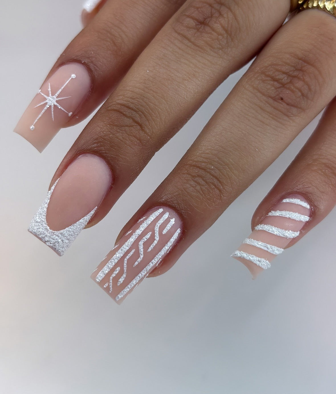 8. Geometric Snow White Nail Art (White Winter Nail Ideas)