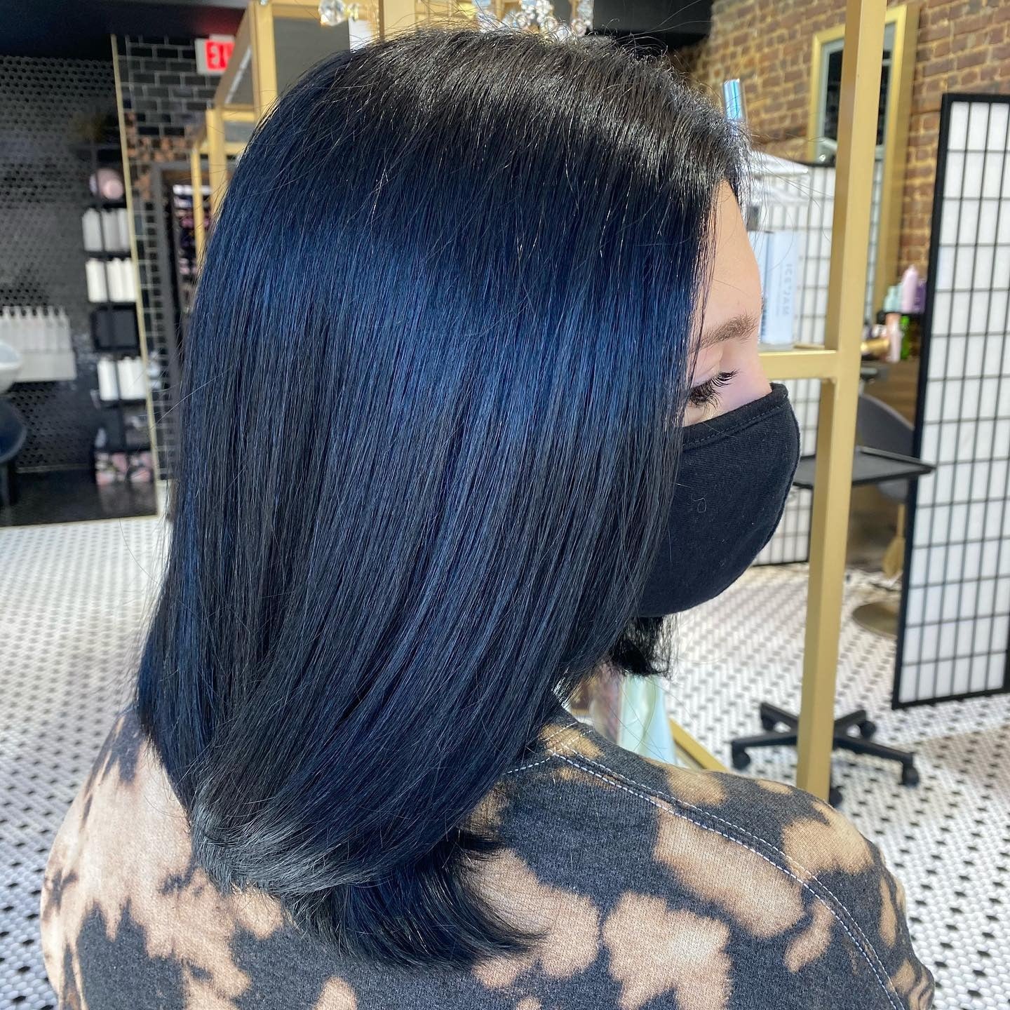 9. Blue-Black Lob with Layers (Blue Black Hair Color)