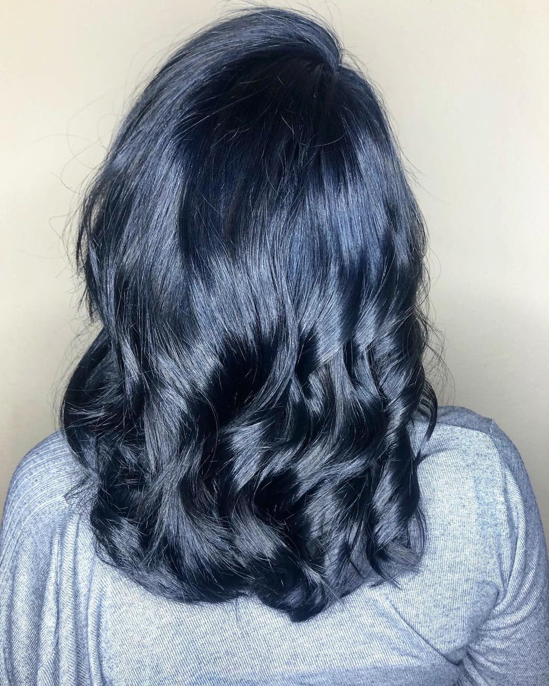 11. Wavy Blue-Black Lob (Blue Black Hair Color)