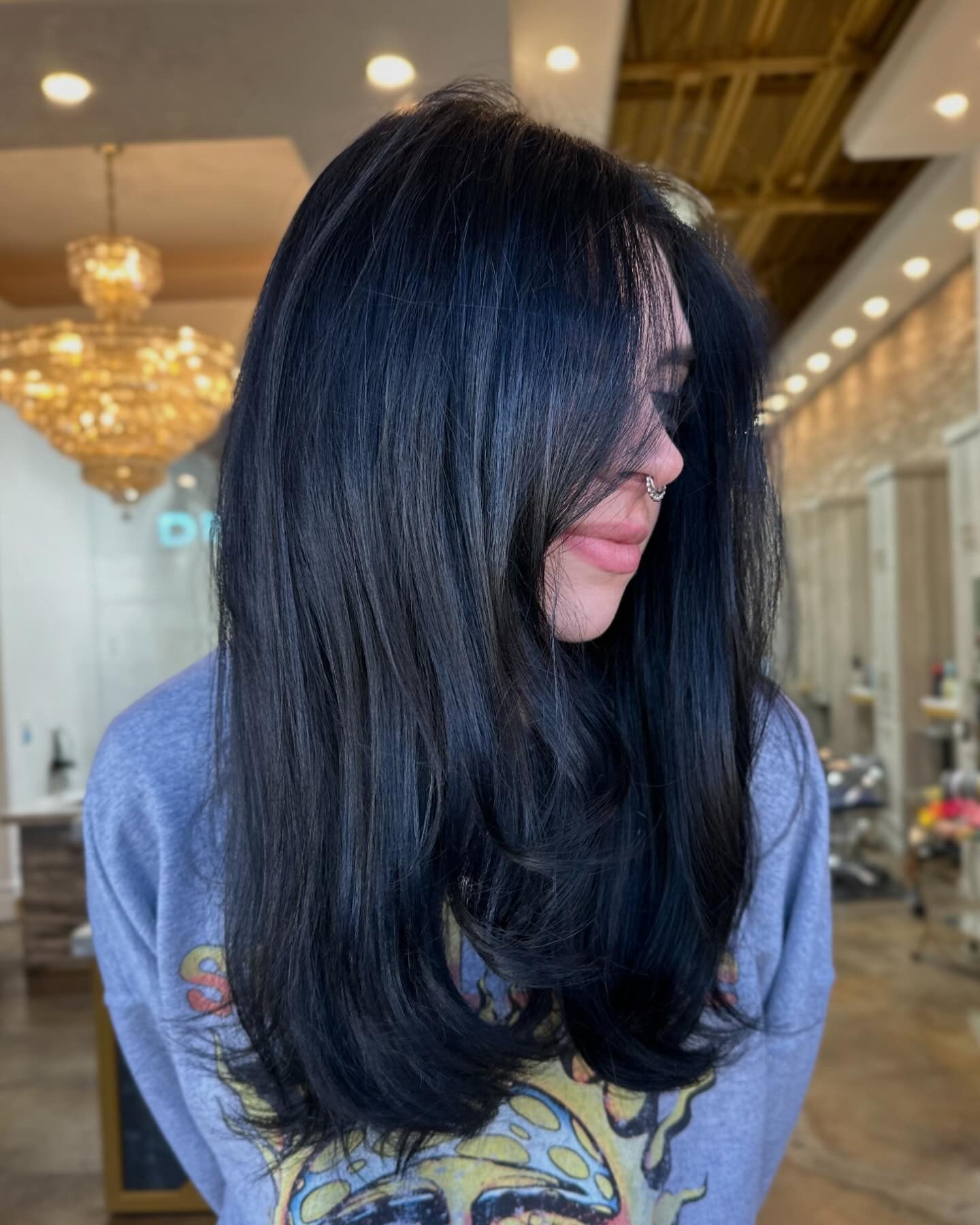 13. Layered Blue-Black with Face-Framing Volume (Blue Black Hair Color)