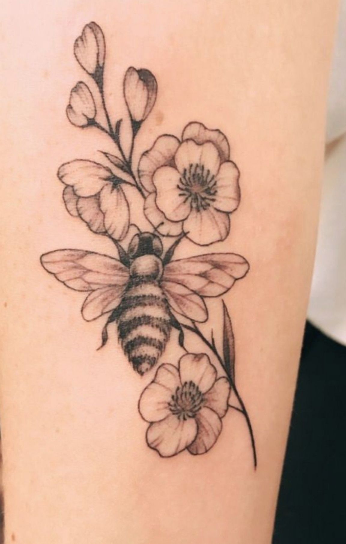 Bumble bee and flowers tattoo | Flower wrist tattoos ...