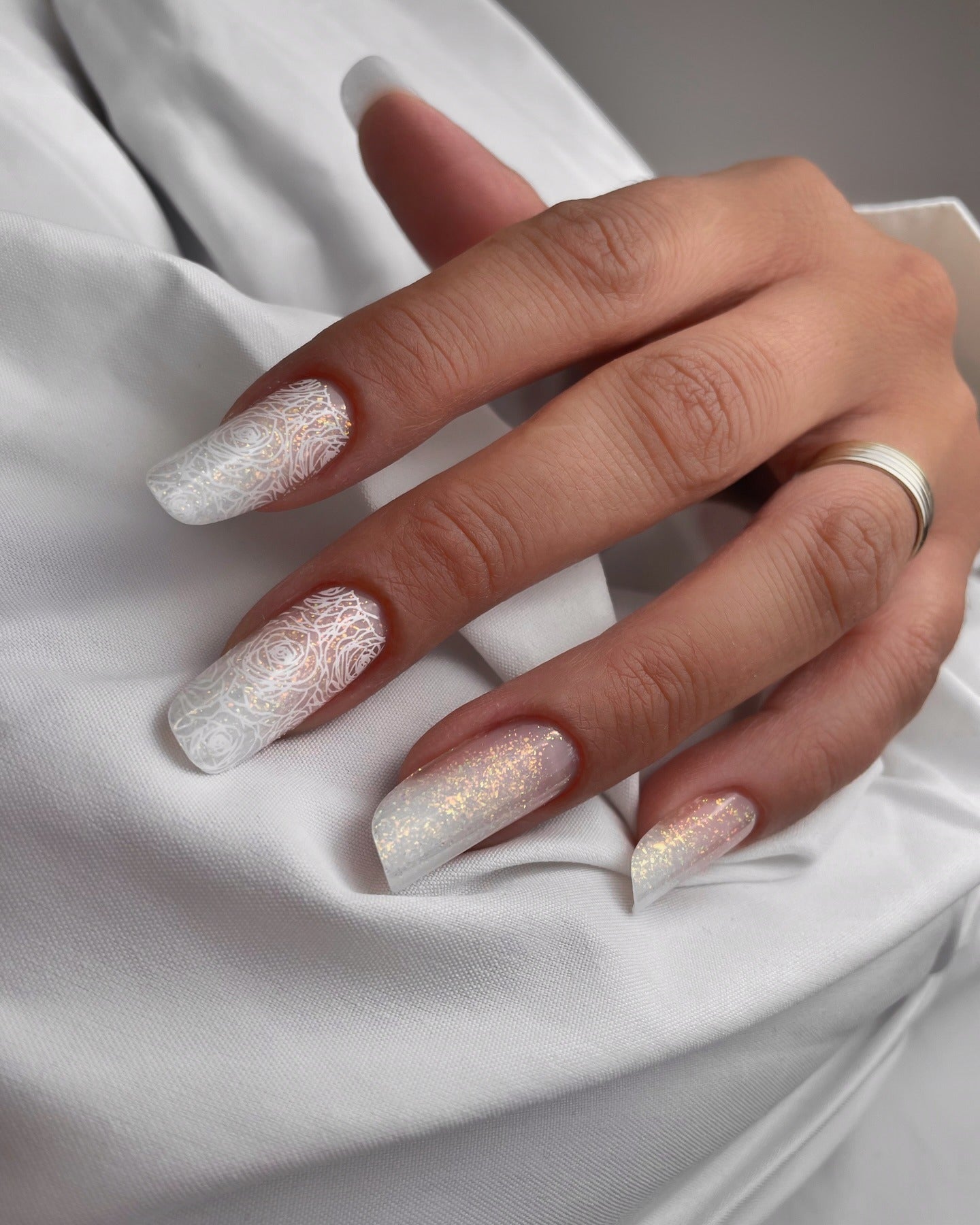 2. White Lace Glow with Glitter Fade (Elegant Nail Ideas)