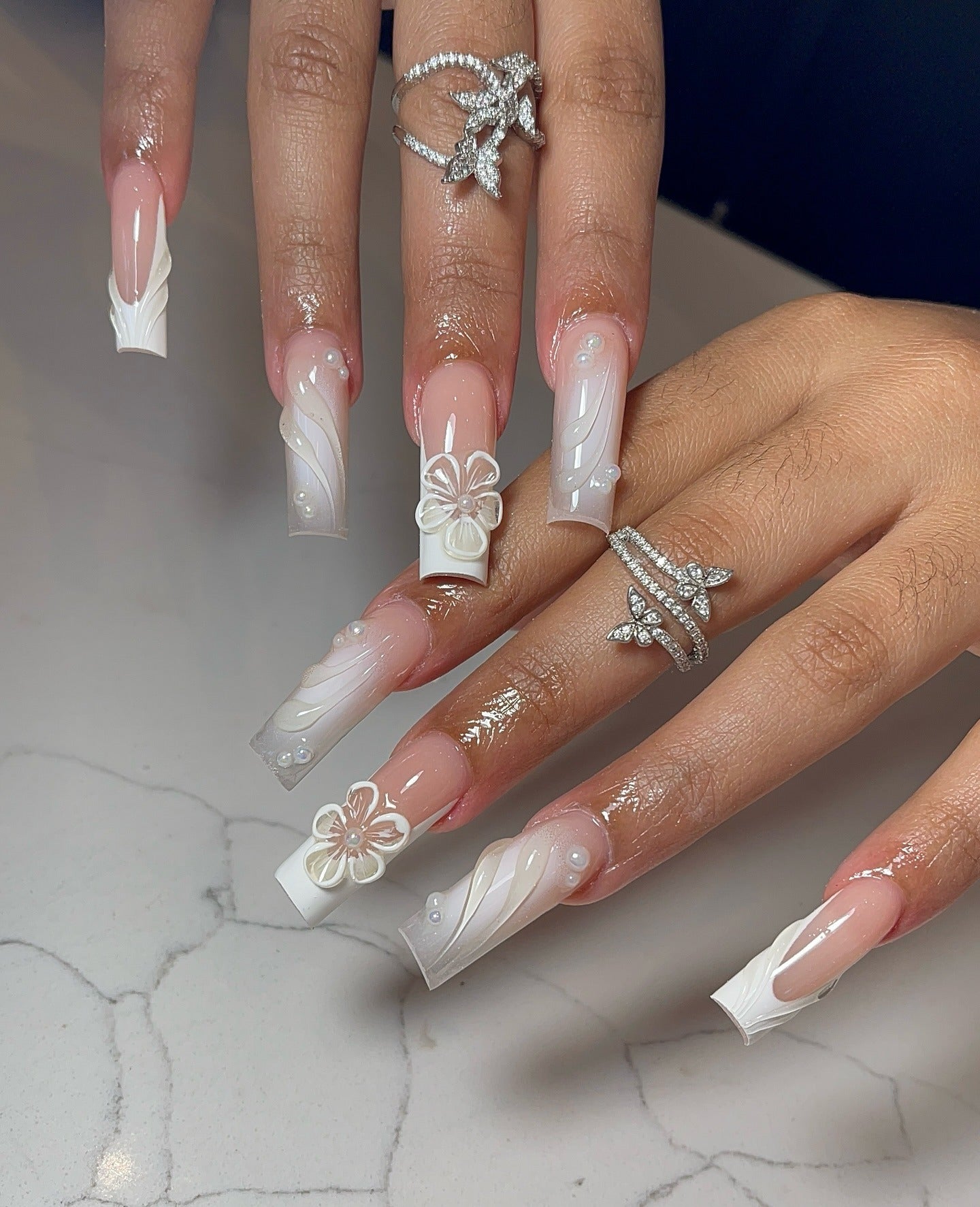 4. 3D Floral Glamour on Nude Ombre (Elegant Nail Ideas)