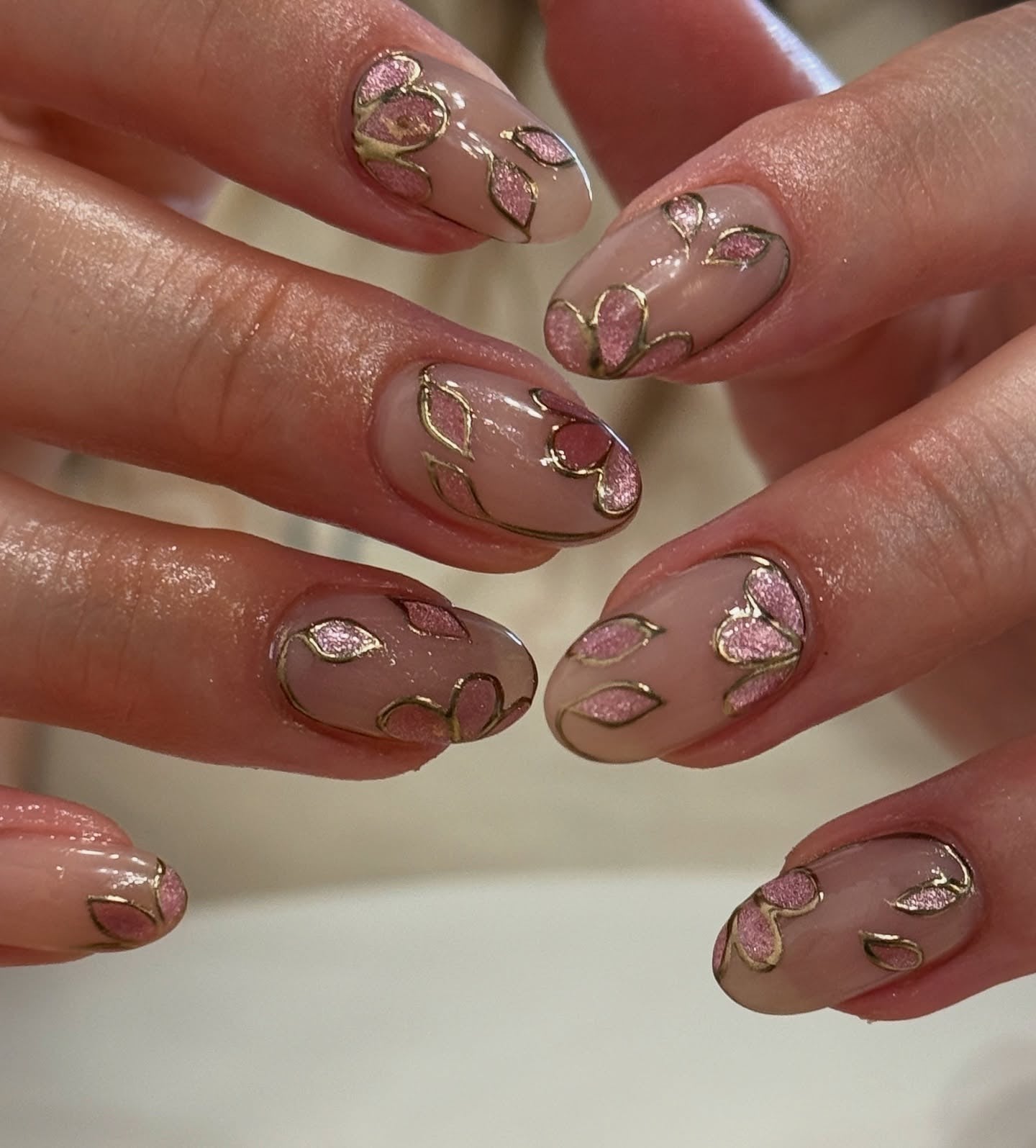 6. Rose Petal Outline with Metallic Accents (Elegant Nail Ideas)