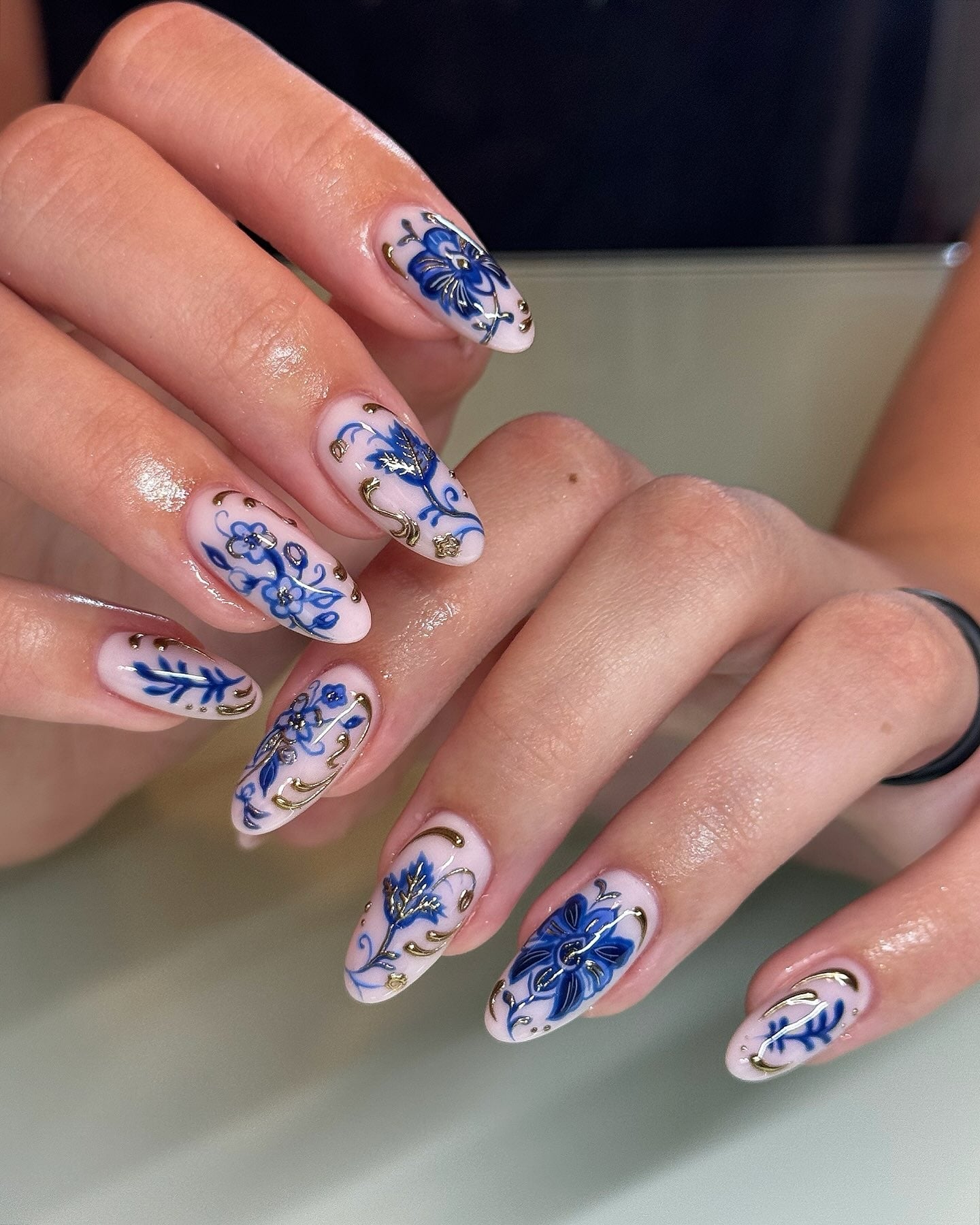 11. Royal Blue Florals with Gold Detailing (Elegant Nail Ideas)