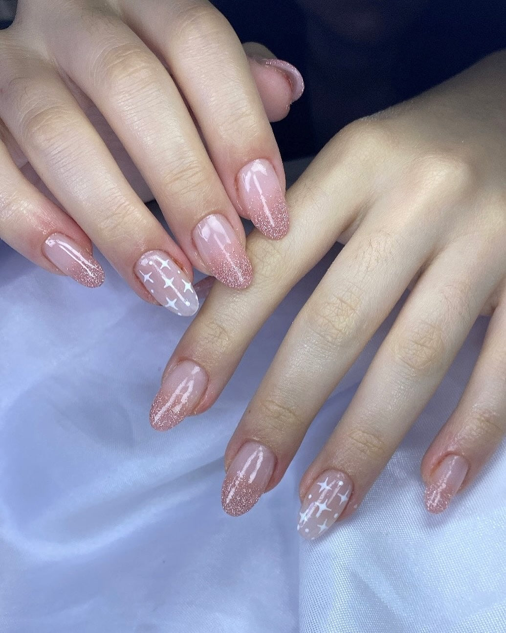 9. Rose Gold Glitter with White Art (Almond Nail Ideas)