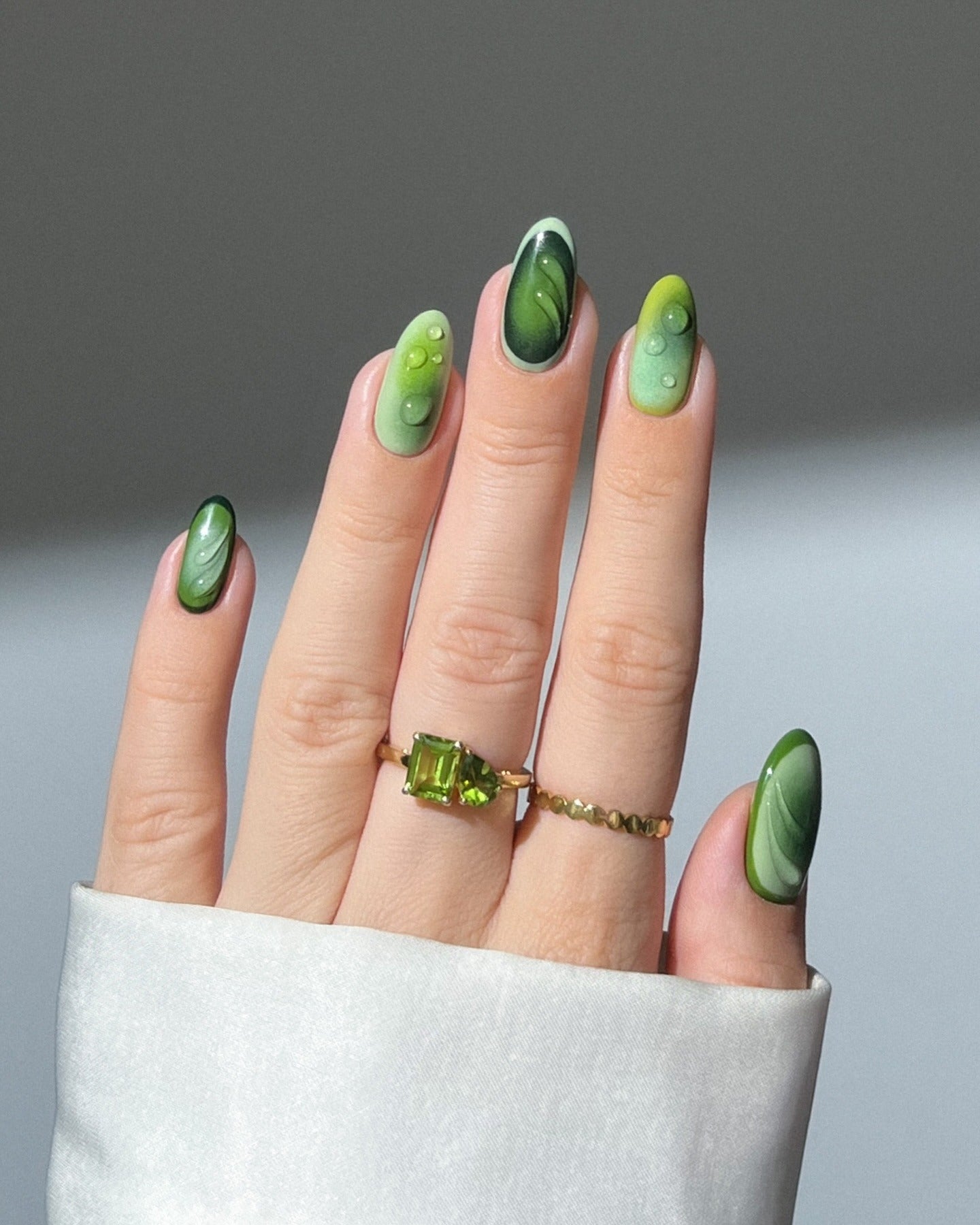 3. Leaf Vein Gloss Gradient (Green Nail Ideas)