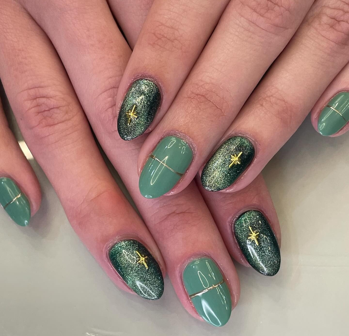 11. Mint and Midnight with Gold Accents (Green Nail Ideas)