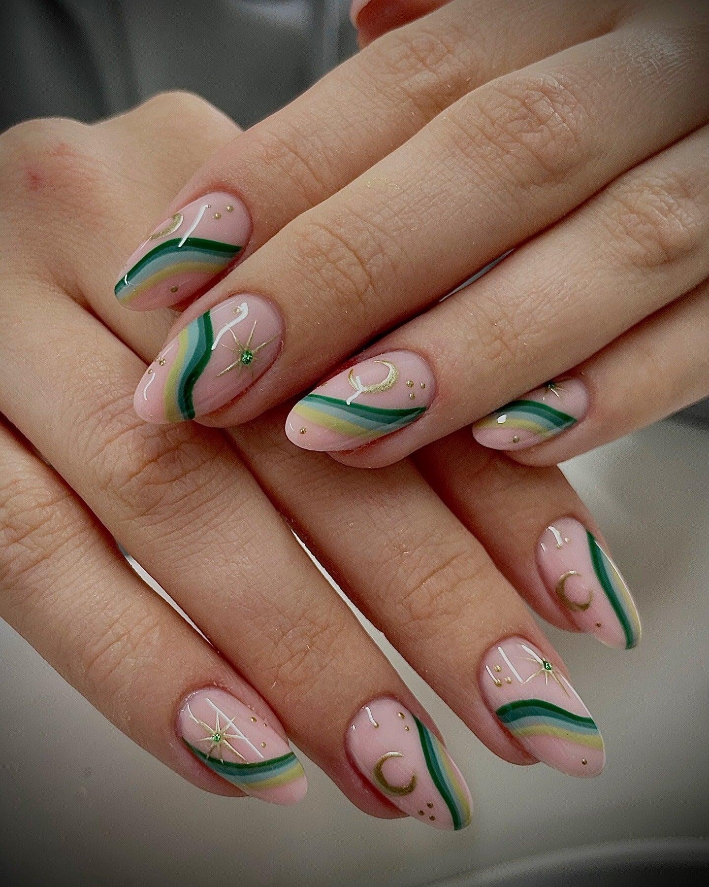 15. Celestial Striped Pastels (Green Nail Ideas)