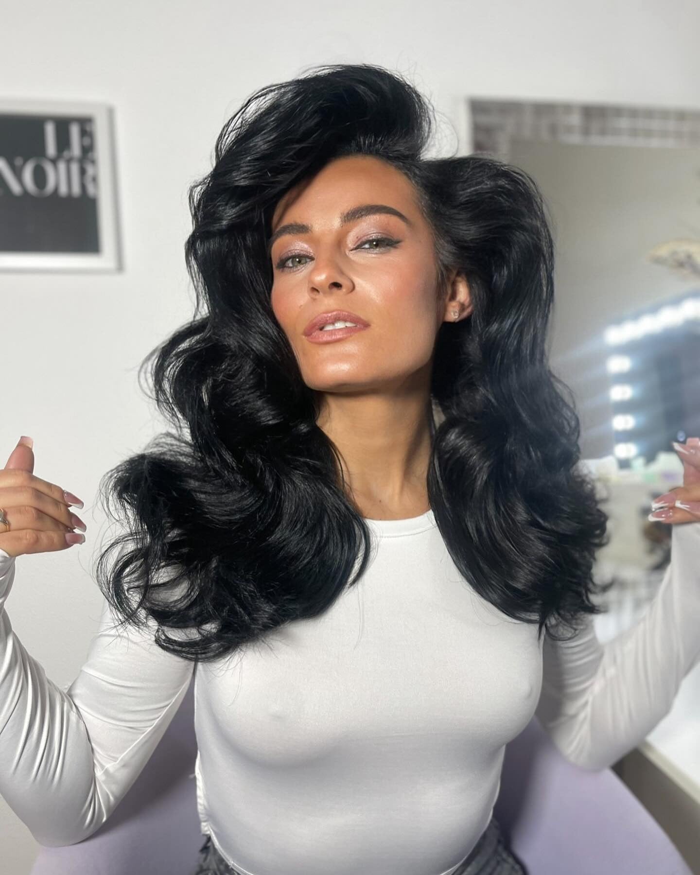 3. Draped Ebony Curls (Old Money Hair)