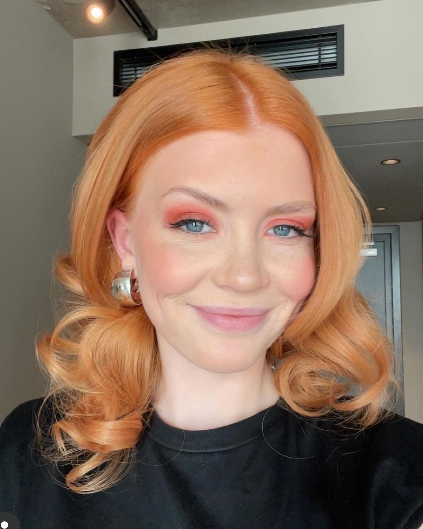 6. Classic Auburn Roll-Set (Old Money Hair)