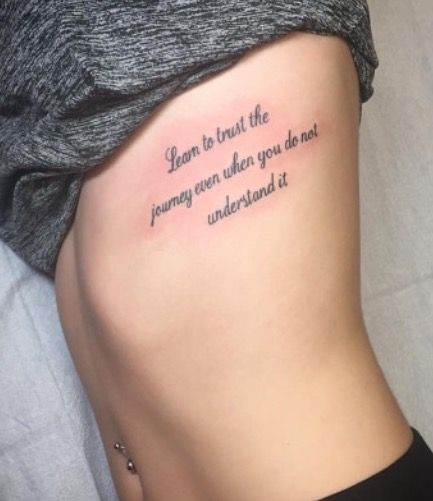 Empowering Quote Ribcage Tattoos