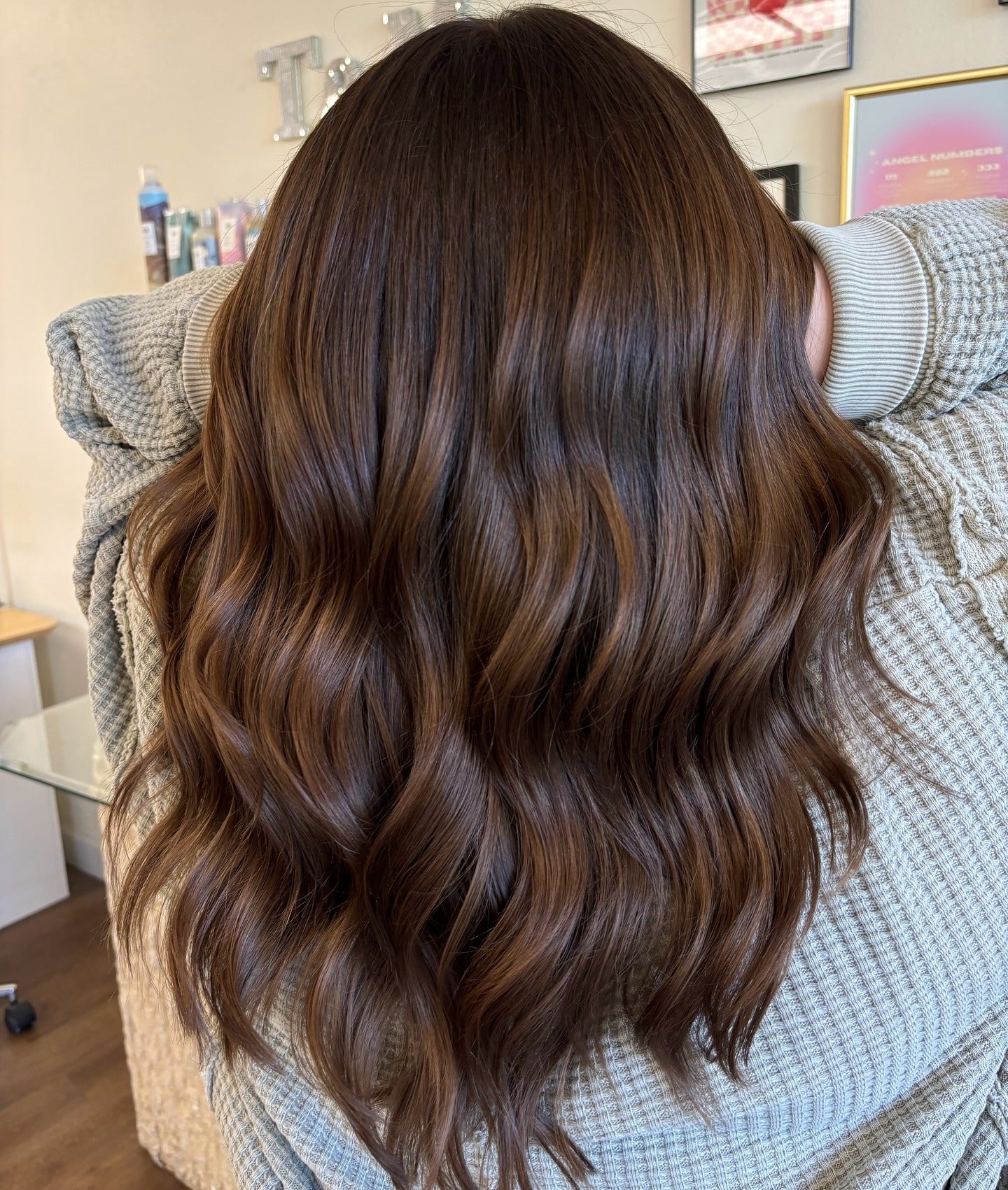 12. Glossy Chestnut Waves (Brunette Hair Color)