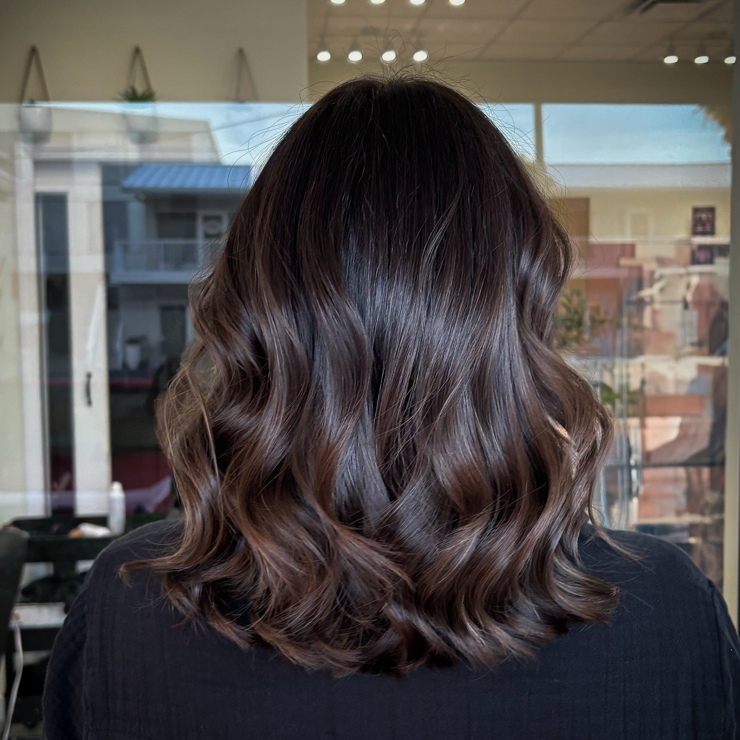 17. Polished Mocha Waves (Brunette Hair Color)