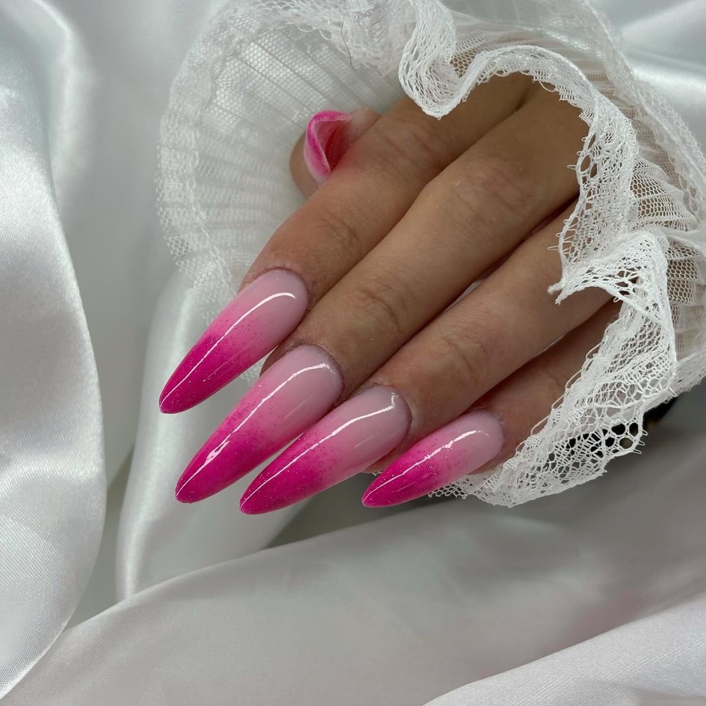 10. Barbie Pink Fade on Stiletto Nails (Ombre Nail Ideas)