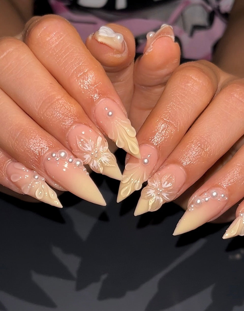 17. Buttercream Ombre with Sculpted Flowers and Pearls (Ombre Nail Ideas)