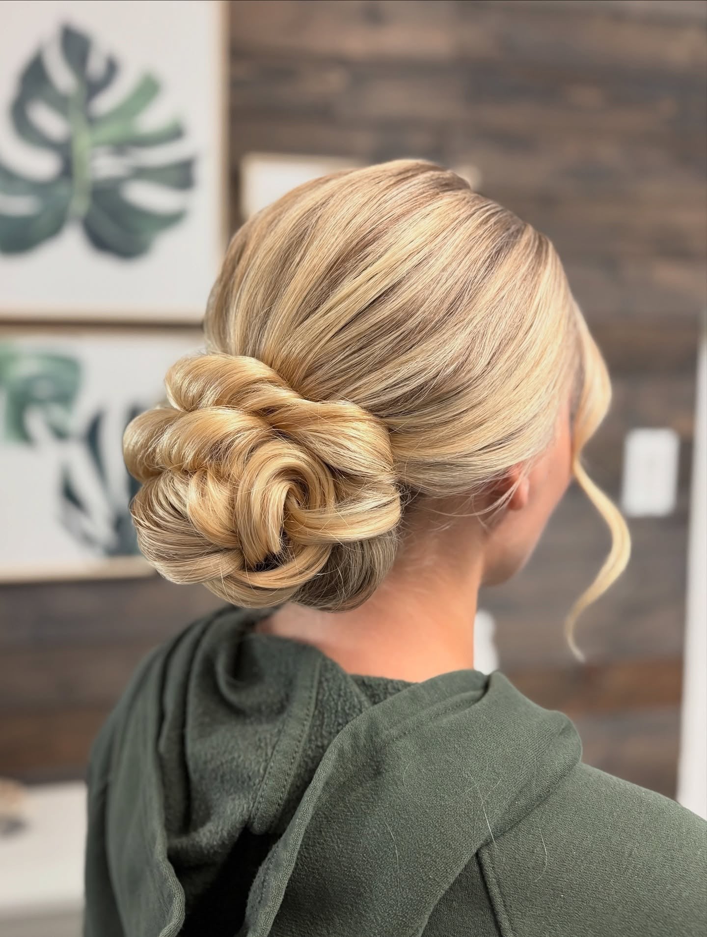4. Smooth Low Blonde Swirl Bun (Updo Hairstyles)