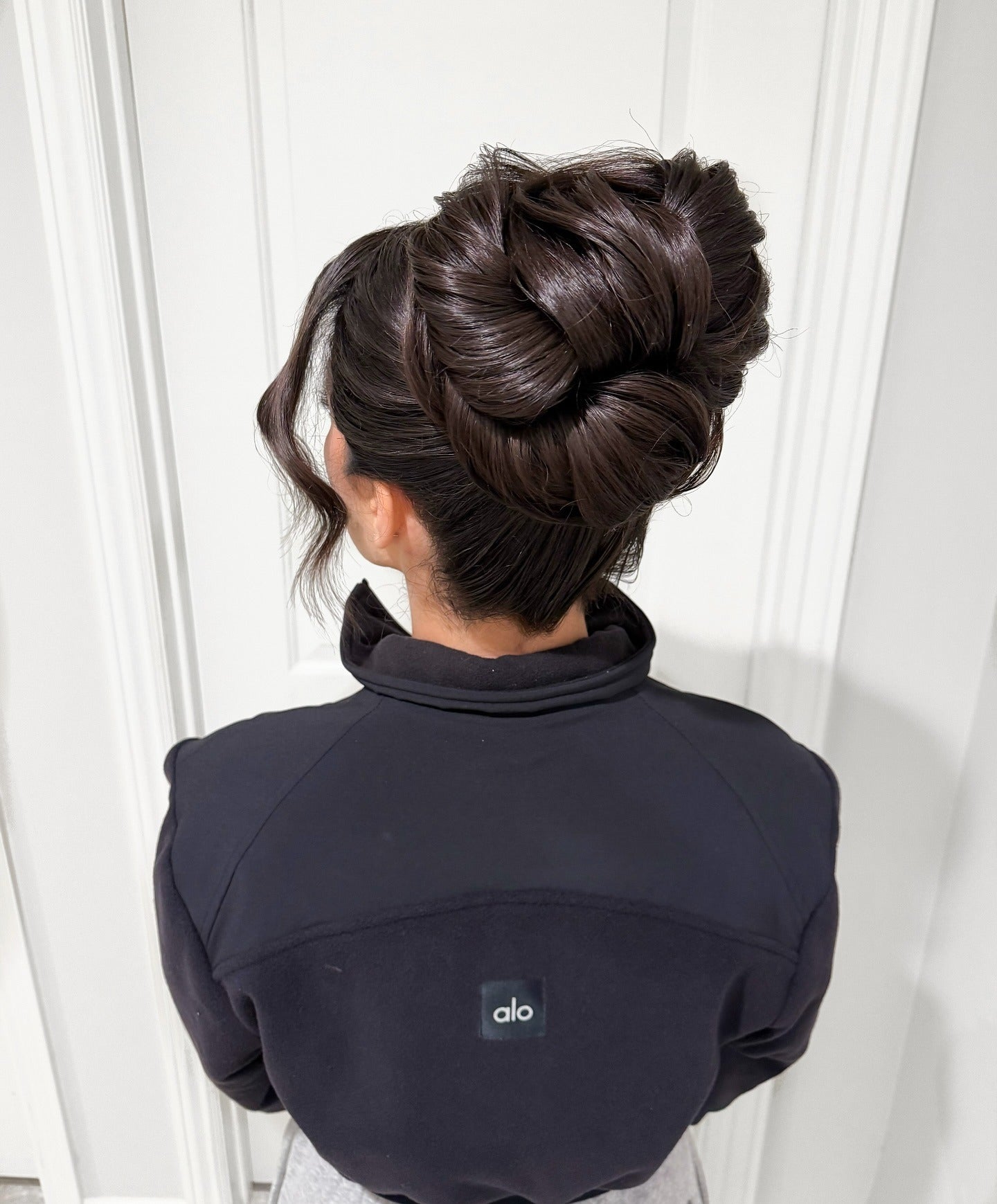7. Sleek Espresso Brown Structured Bun (Updo Hairstyles)