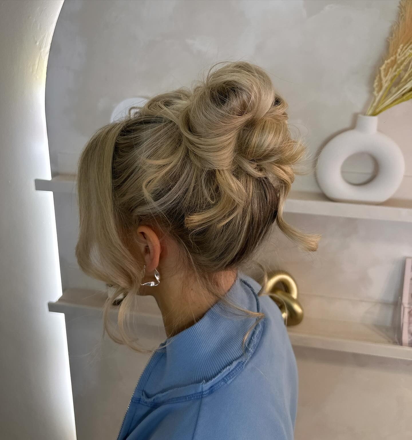 15. Platinum Blonde Tousled Bun (Updo Hairstyles)