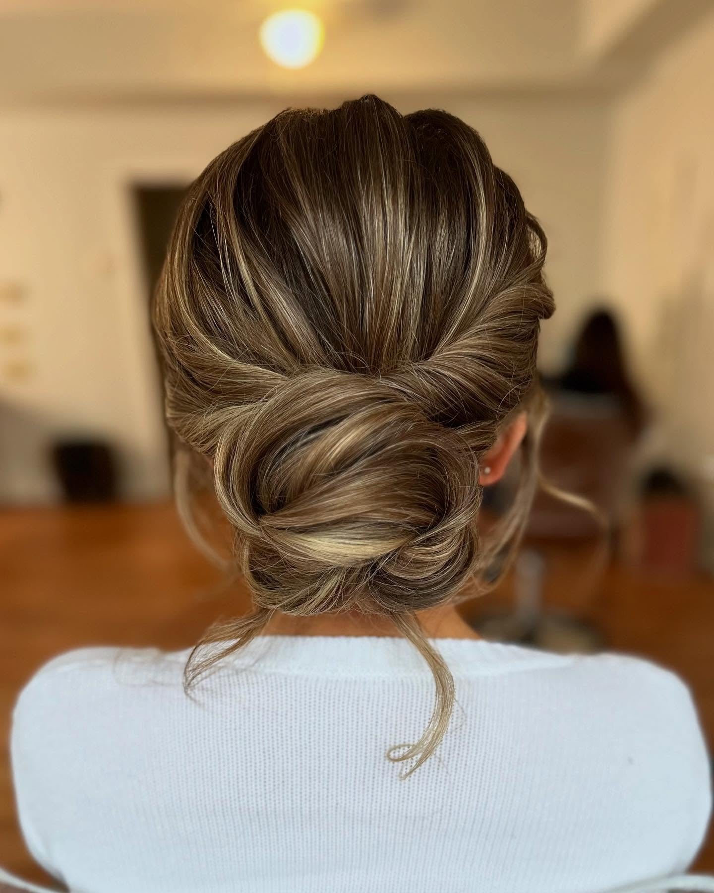 17. Ash Blonde Low Rolled Bun (Updo Hairstyles)