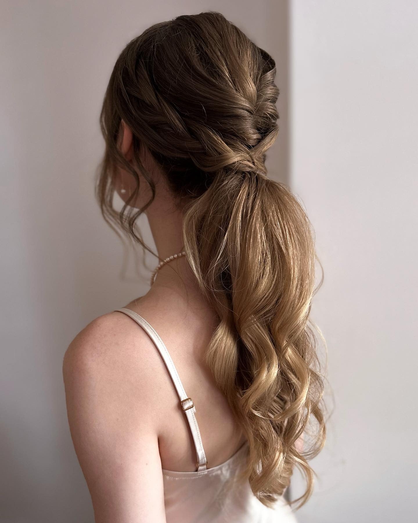 11. Twisted Low Ponytail with Soft Waves in Light Chestnut Ombre (Bridesmaid Hairstyles)