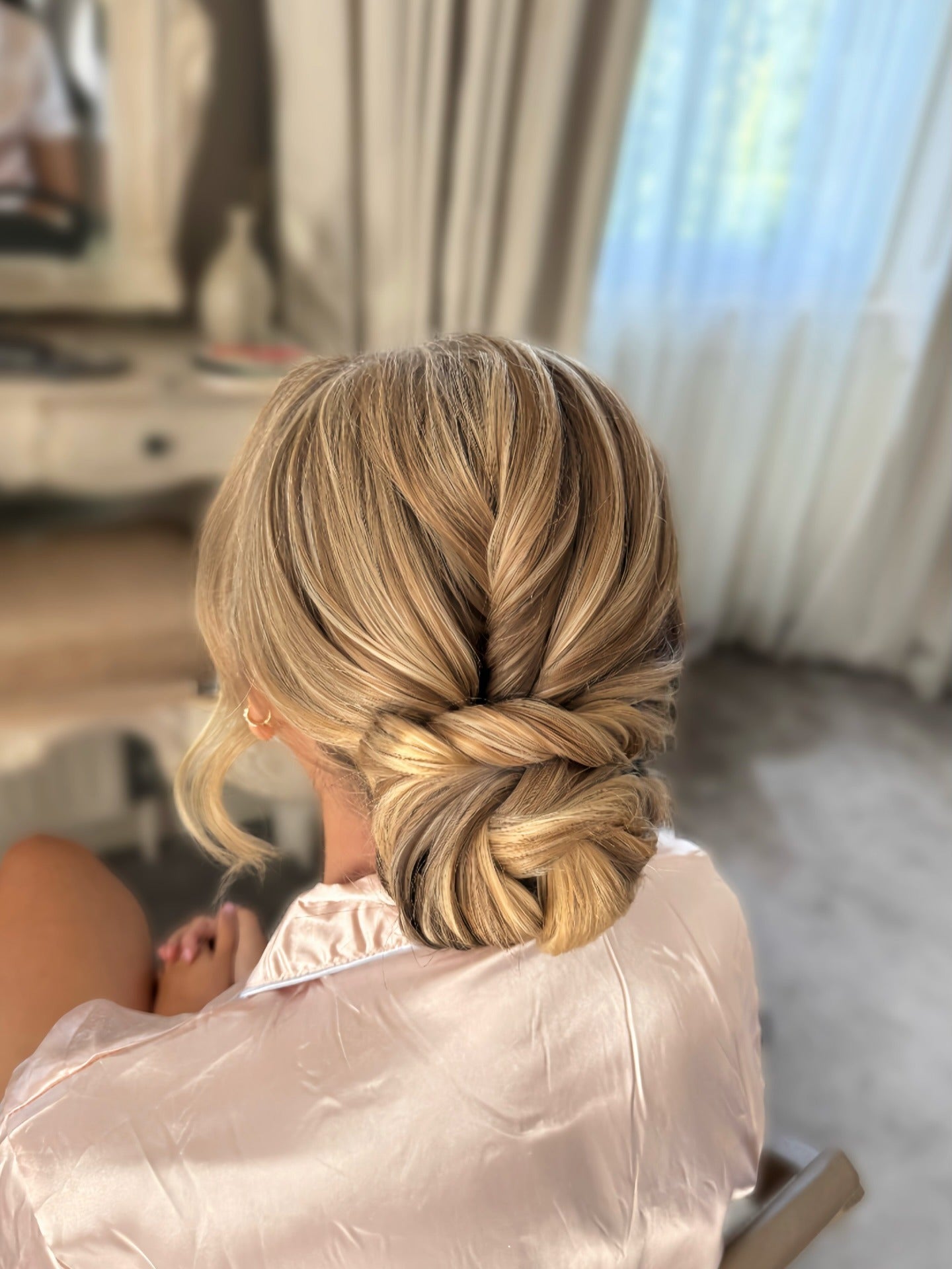 18. Braided Low Bun in Dimensional Golden Blonde (Bridesmaid Hairstyles)