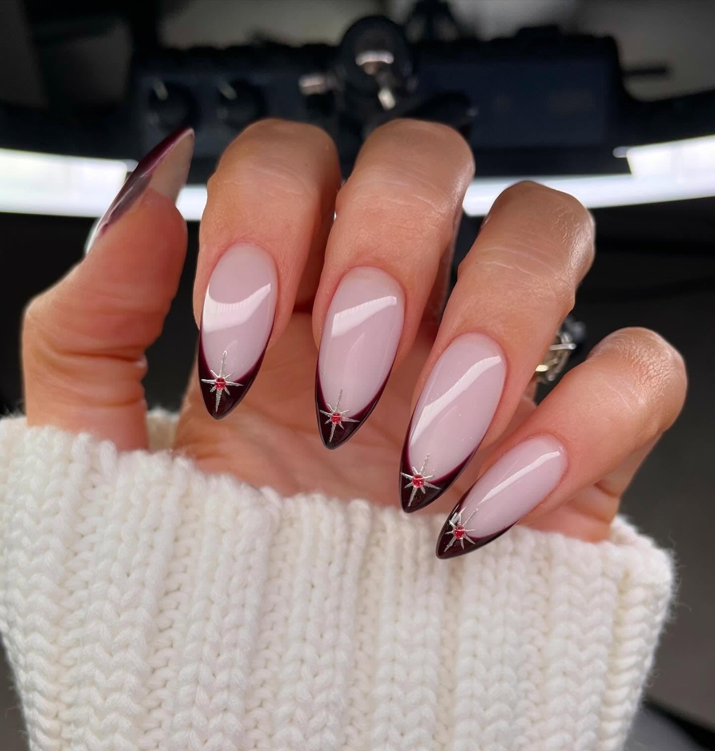 12. Burgundy French with Star Accents (Burgundy Nail Ideas)