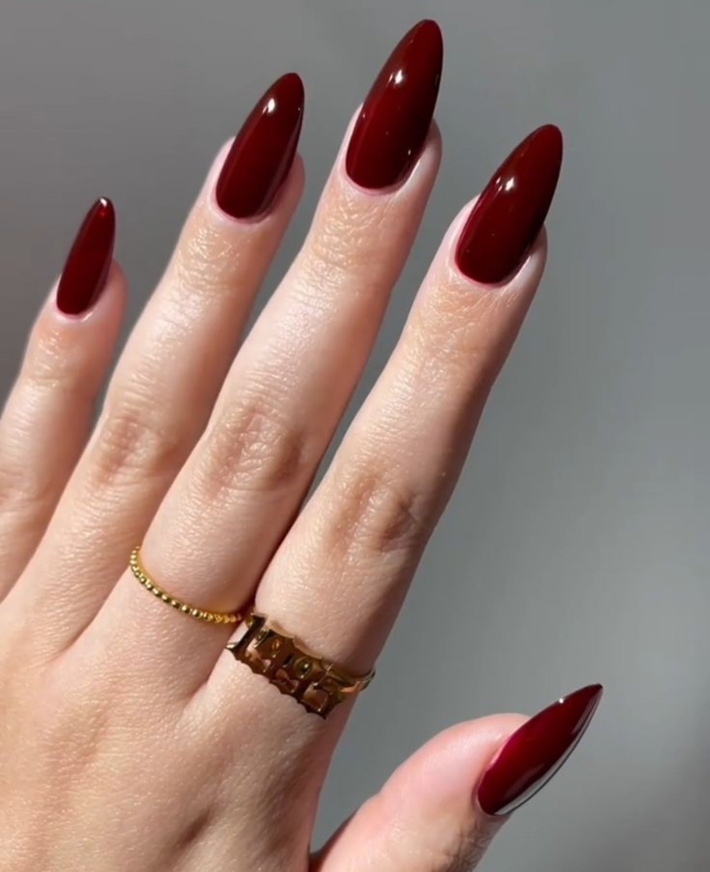 14. Glossy Burgundy Almond Nails (Burgundy Nail Ideas)