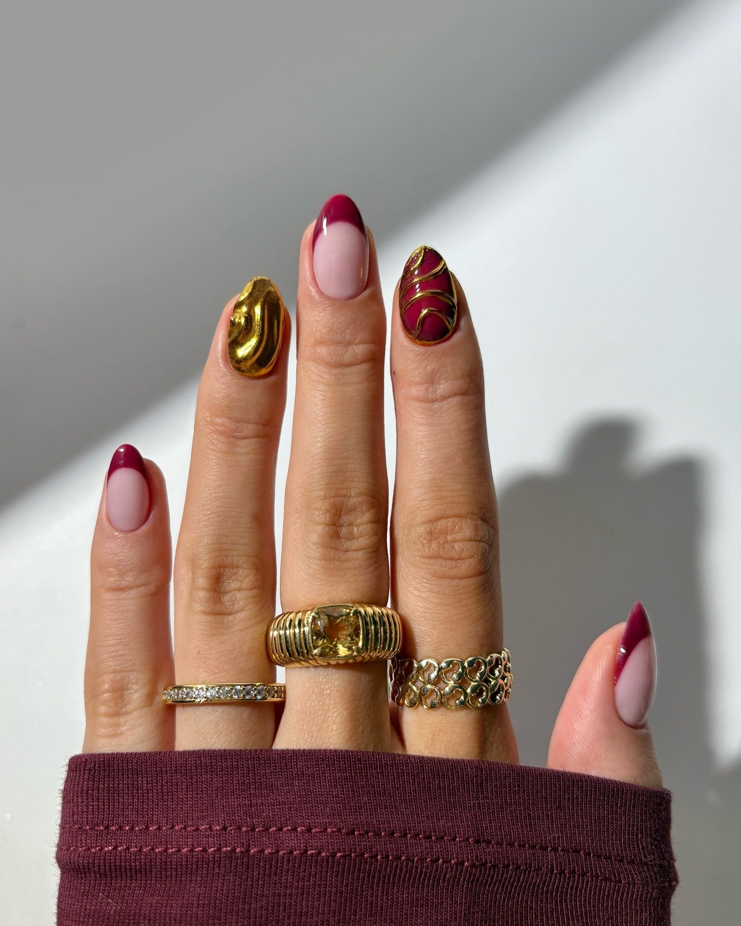 15. Burgundy and Gold Artistic Mix (Burgundy Nail Ideas)