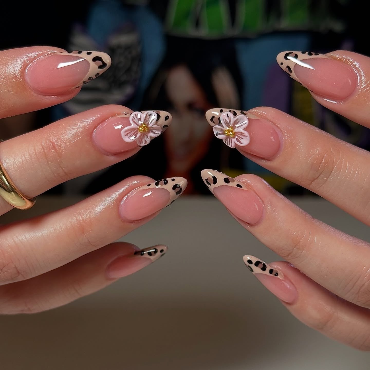 11. Nude Cheetah Tips with Floral Embellishments (Cheetah Nail Ideas)