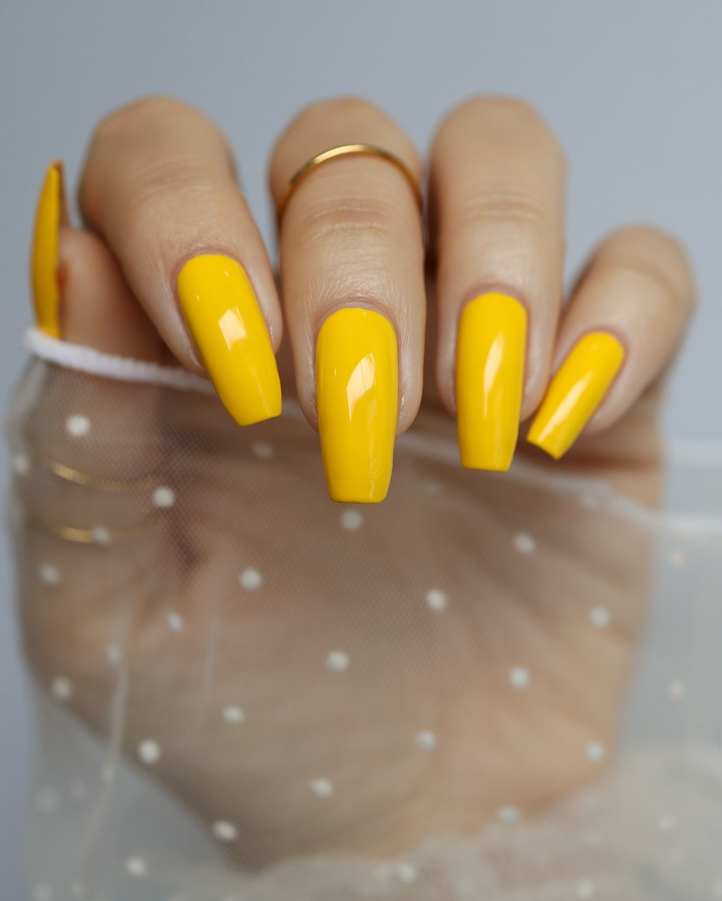 1. Vibrant Marigold Coffin Nails (Yellow Nail Ideas)