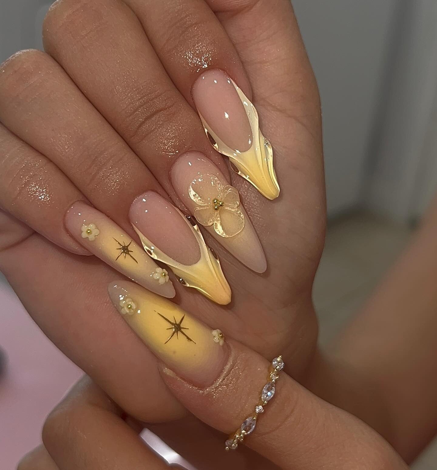 6. Golden Glow Almond Nails with 3D Florals (Yellow Nail Ideas)