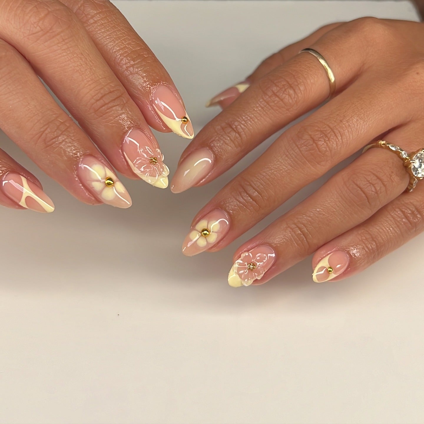 12. Pastel Yellow Floral Accent Nails (Yellow Nail Ideas)