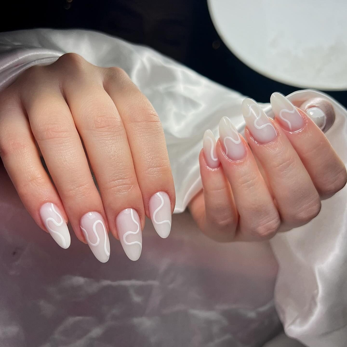 5. Glossy Milky Nails with Wavy White Tips (Milky Nail Ideas)