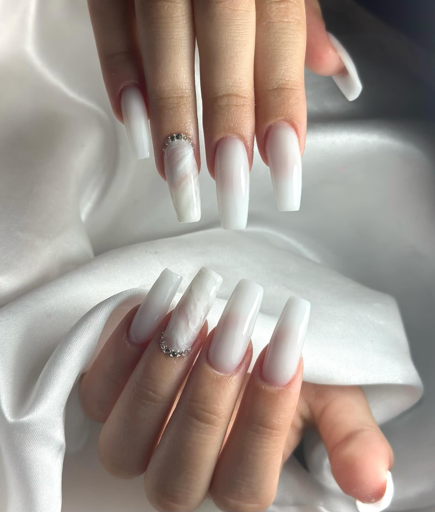 9. Milky Coffin Nails with Pearl Marbling and Rhinestones (Milky Nail Ideas)