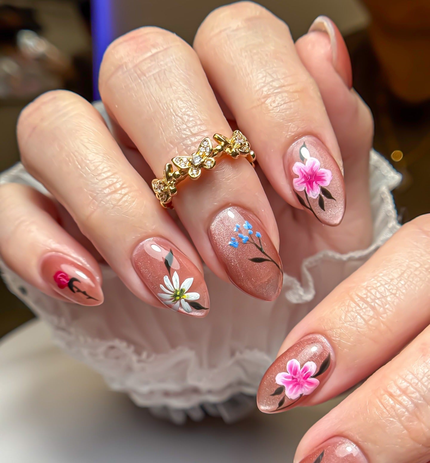 4. Elegant Petal Accents (Floral Nail Ideas)