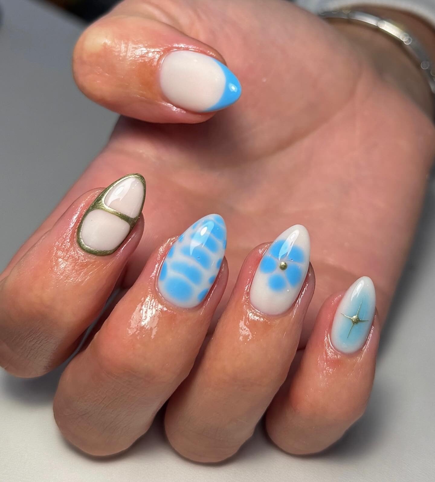 10. Artistic Blue and White Mixed Nail Design (Light Blue Nail Ideas)