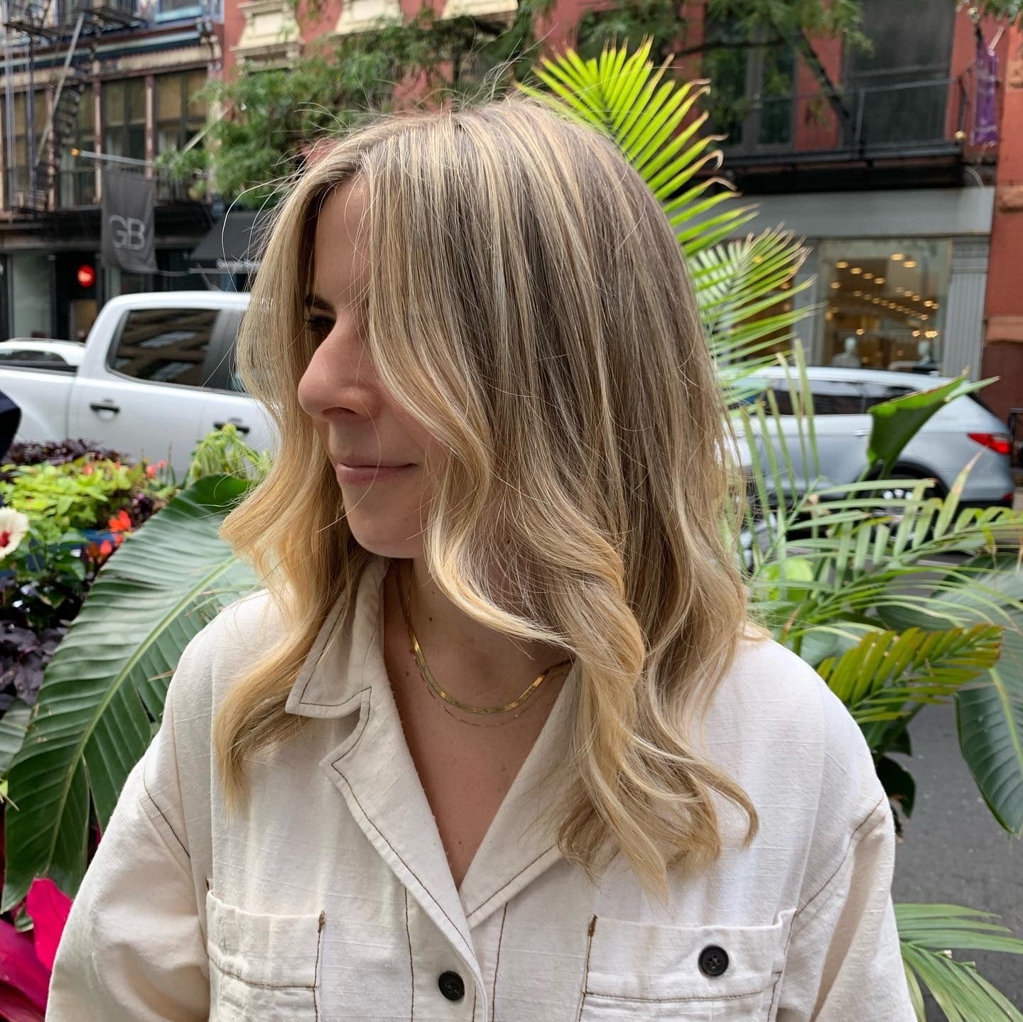 2. Sun-Kissed Sandy Medium Length (Sandy Hair Color)