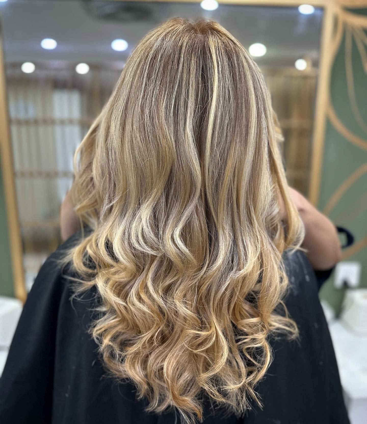 16. Curled Sandy Blonde with Light Dimension (Sandy Hair Color)