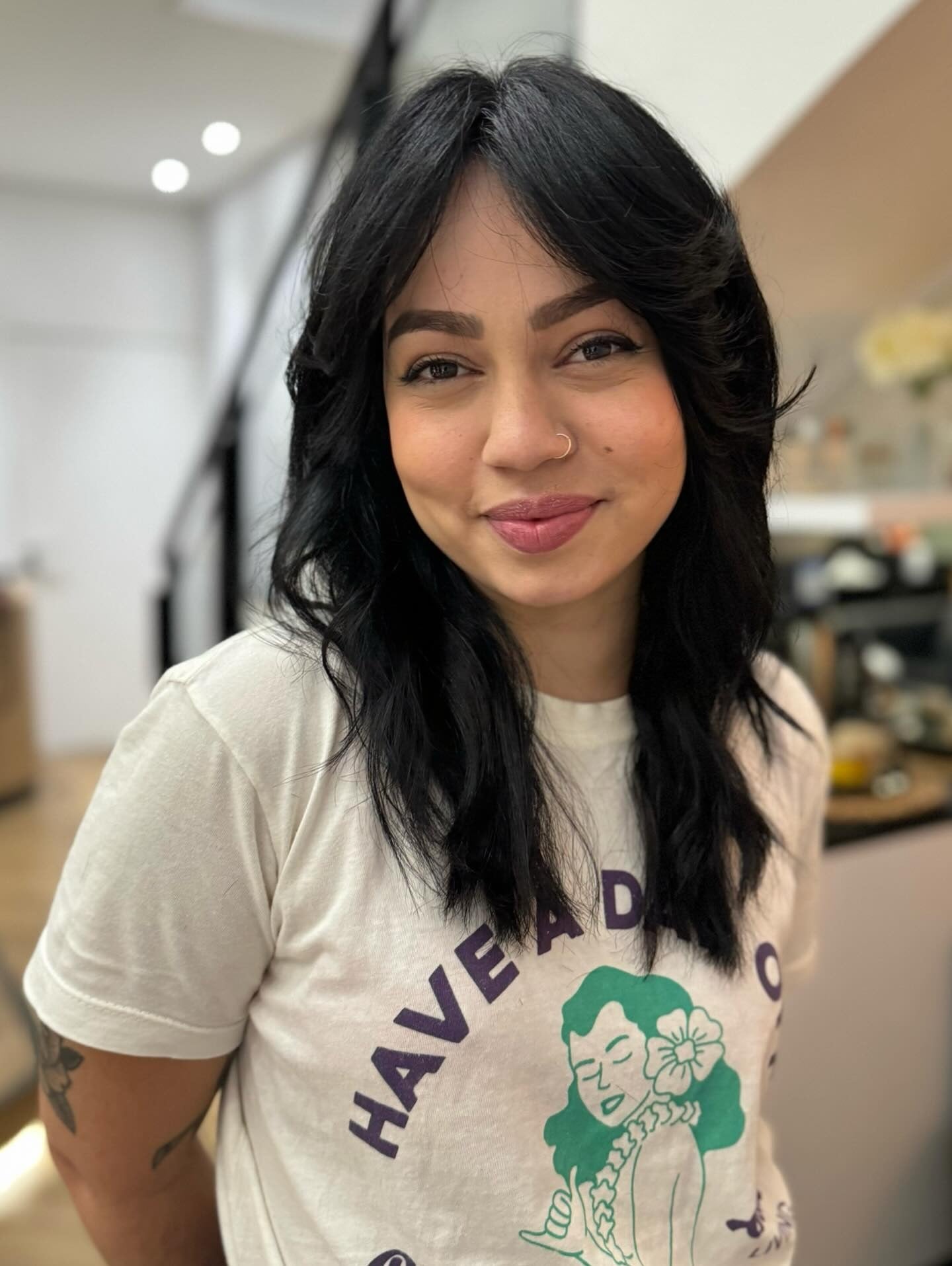 2. Soft Black Layered Shag with Curtain Bangs (Shaggy Haircut)