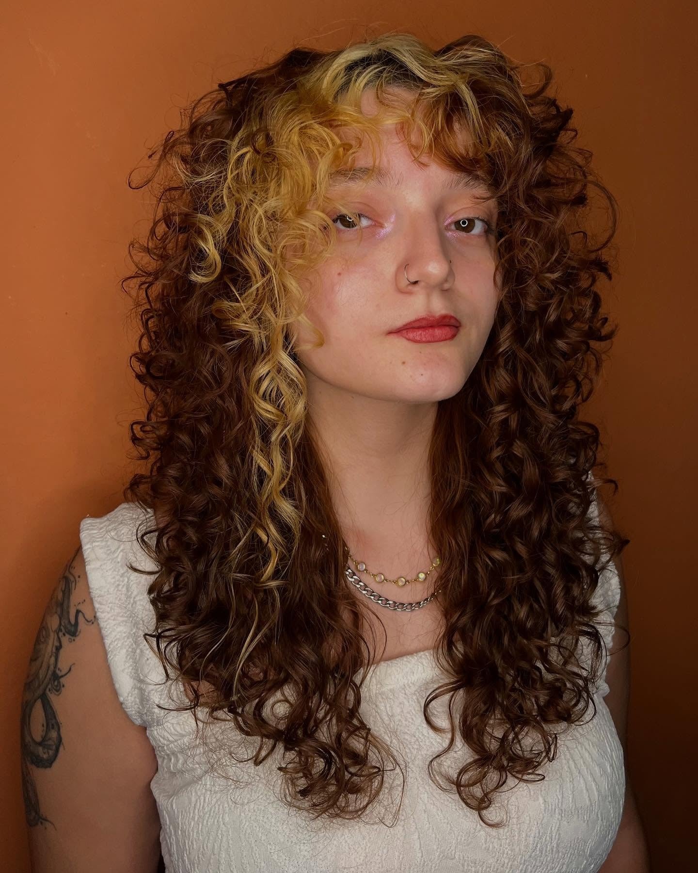 5. Two-Tone Curly Shag with Face Highlights (Shaggy Haircut)