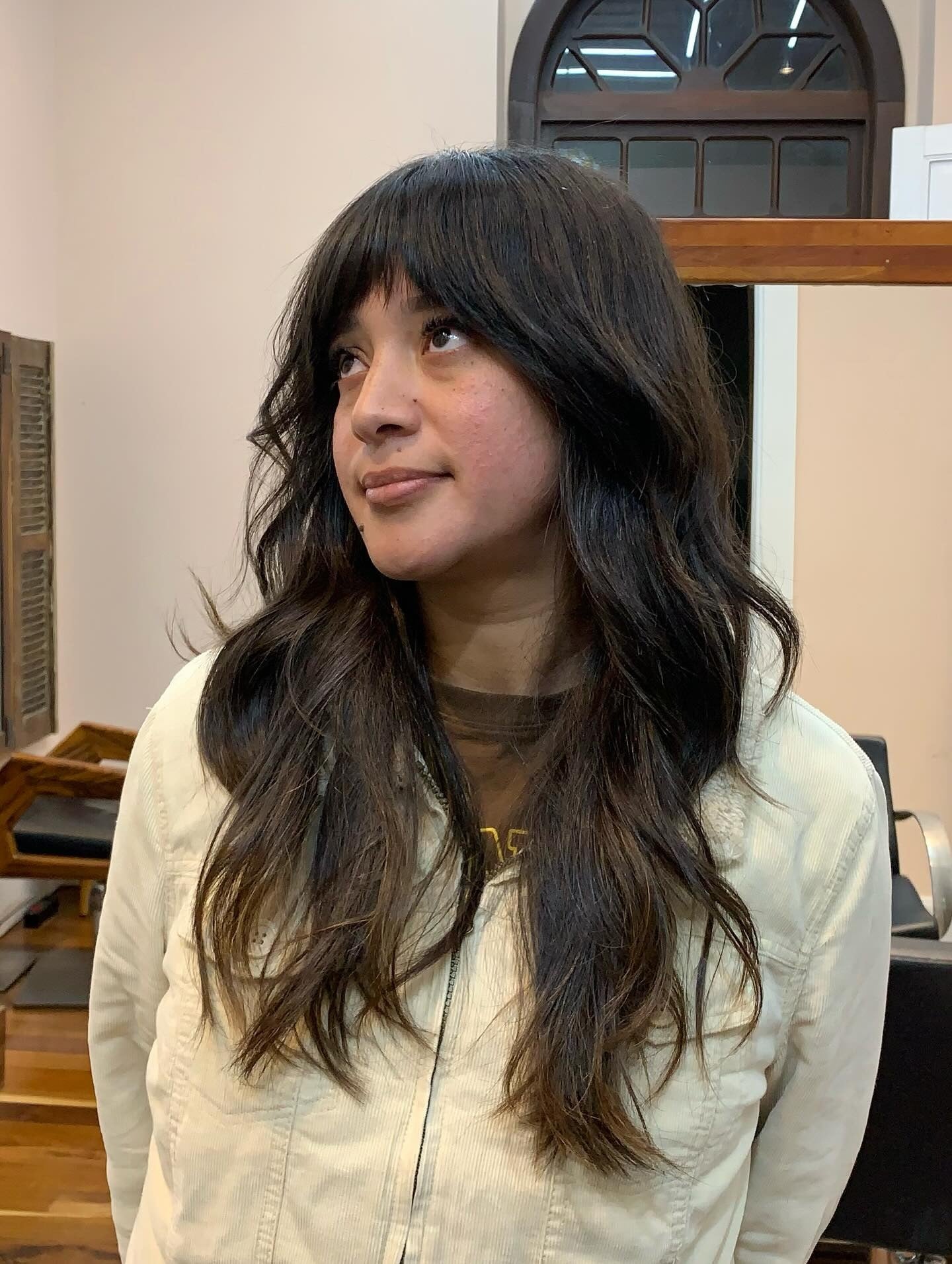 15. Long Textured Shag with Brow-Skimming Bangs (Shaggy Haircut)