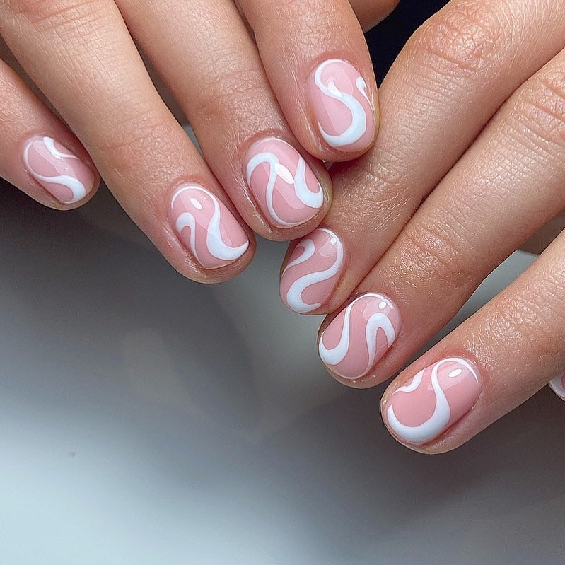 4. Sheer Pink with White S-Curves (Short Nail Ideas)